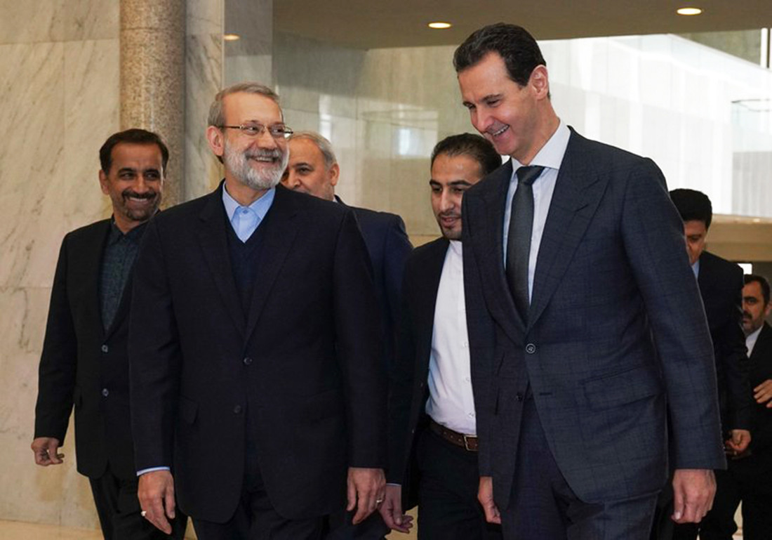Tổng thống Syria Bashar al-Assad (phải) gặp chủ tịch Quốc hội Iranhoom hôm 16/2. Ảnh: AP