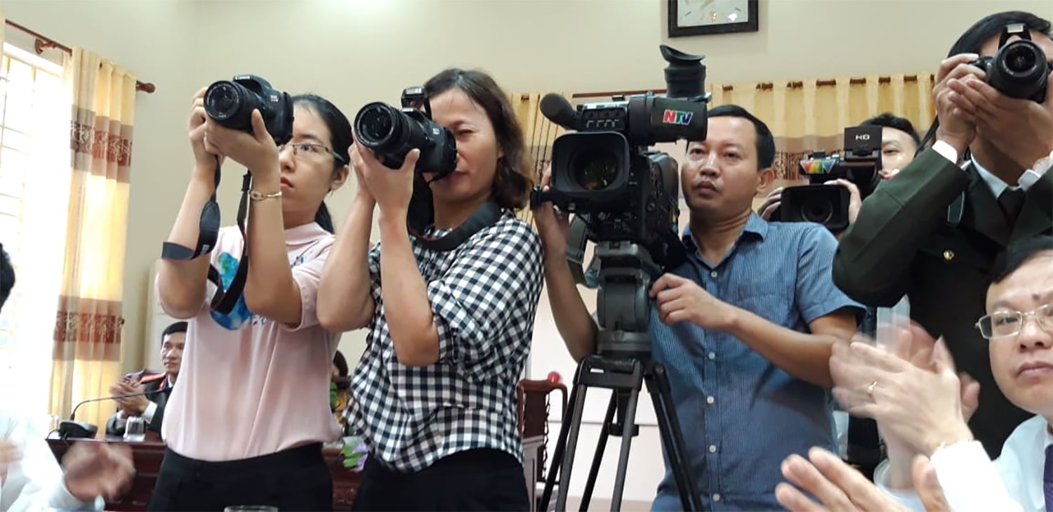 Phóng viên tác nghiệp trong một sự kiện. Ảnh: CTV