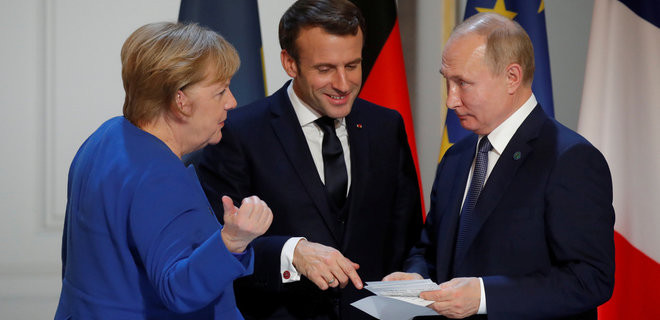 Thủ tướng Đức Angela Merkel đã từng đề nghị cập nhật điều khoản trong Thỏa thuận Minsk, song Tổng thống Nga Putin phản đối. Ảnh: EPA