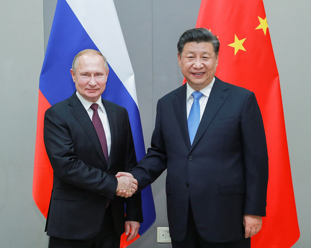 Tổng thống Nga Putin và Chủ tịch Trung Quốc Tập Cận Bình thường xuyên ca ngợi mối quan hệ Nga_Trung nồng ấm chưa từng có. Ảnh: Xinhua