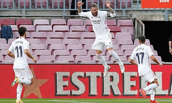 Ramos (giữa) đều ghi bàn từ 23 cú sút phạt đền gần nhất. Ảnh: Reuters