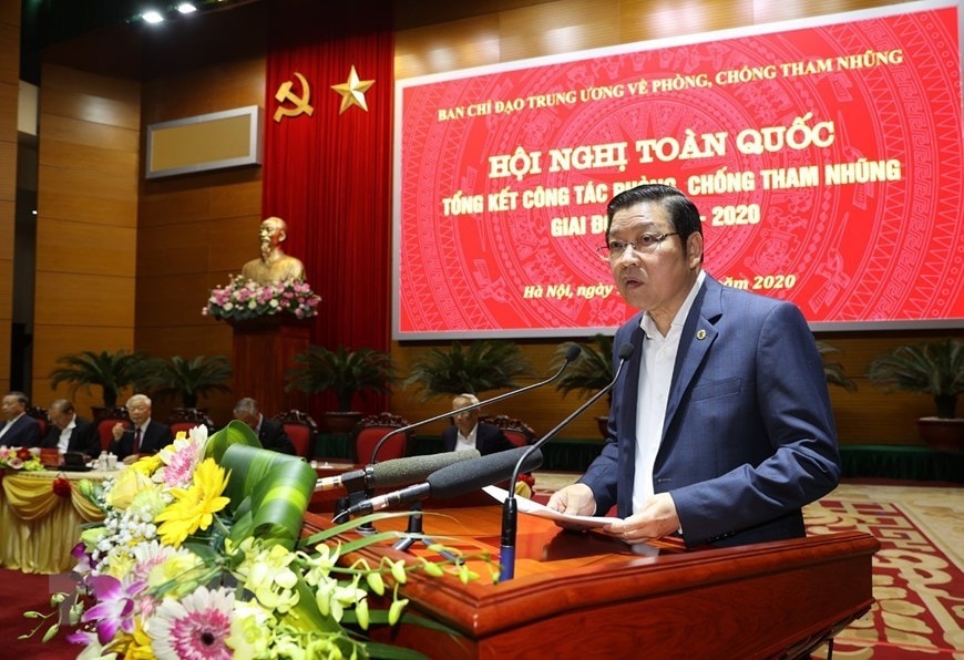 Đồng chí Phan Đình Trạc - Bí thư Trung ương Đảng, Phó Trưởng ban thường trực Ban Chỉ đạo Trung ương về phòng, chống tham nhũng, Trưởng Ban Nội chính Trung ương trình bày báo cáo kết quả công tác phòng, chống tham nhũng giai đoạn 2013 - 2020. Ảnh: Phương Hoa/TTXVN