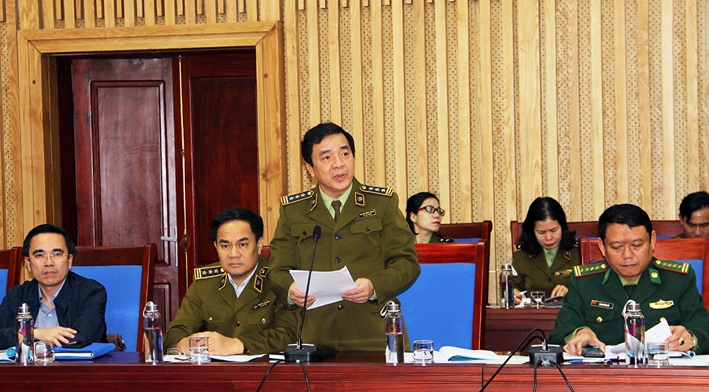 Lãnh đạo Cục Quản lý thị trưởng Nghệ An- Cơ quan thường trực BCĐ báo cáo kết quả hoạt động năm 2020. Ảnh: Phú Hương