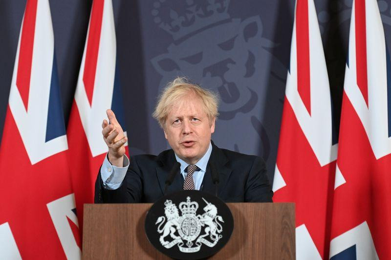 Thủ tướng Anh Boris Johnson tổ chức họp báo về kết quả đàm phán Brexit tại Phố Downing, London hôm 24/12. Ảnh: Reuters