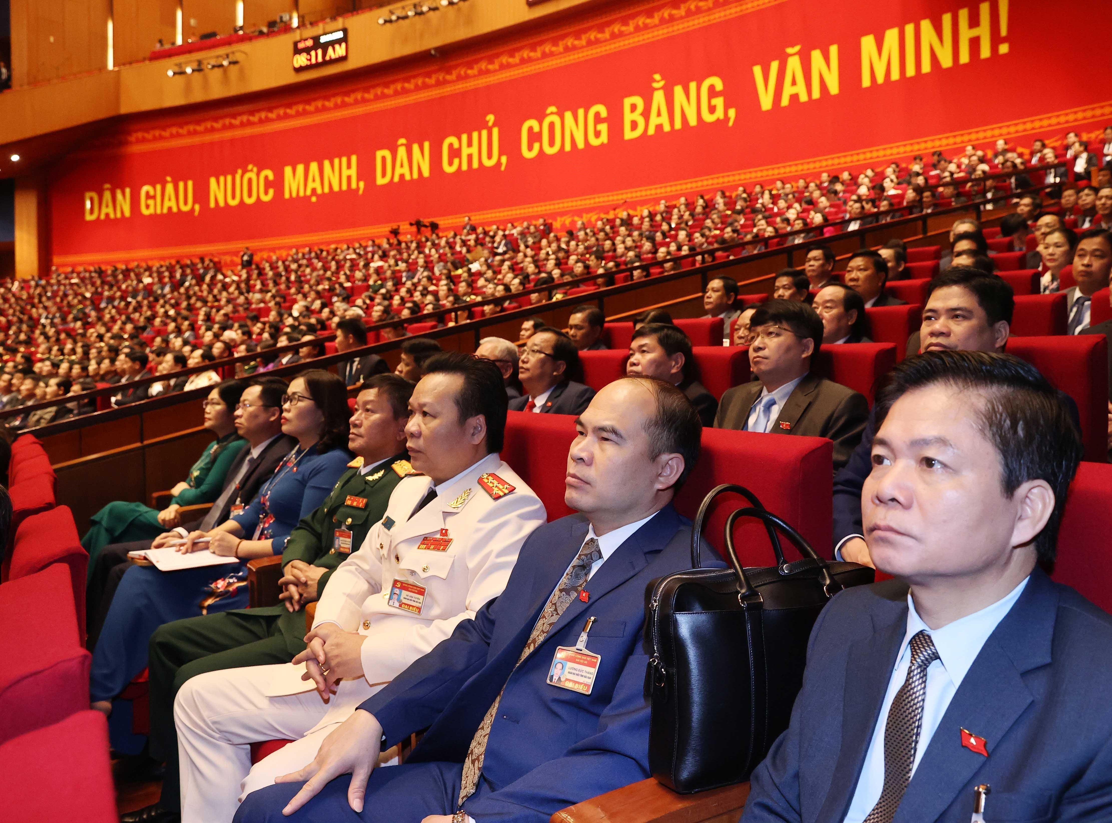 Các đại biểu dự phiên tham luận tại hội trường Trung tâm Hội nghị Quốc gia, sáng 27/1. Ảnh: TTXVN