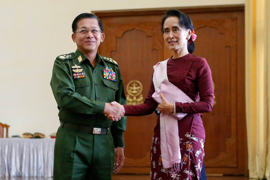 Thống tướng Min Aung Hlaing và bà Aung San Suu Kyi. Ảnh: The Guardian