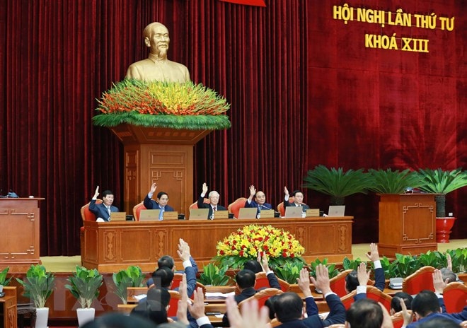 Các đại biểu biểu quyết thông qua chương trình hội nghị. Ảnh: TTXVN 