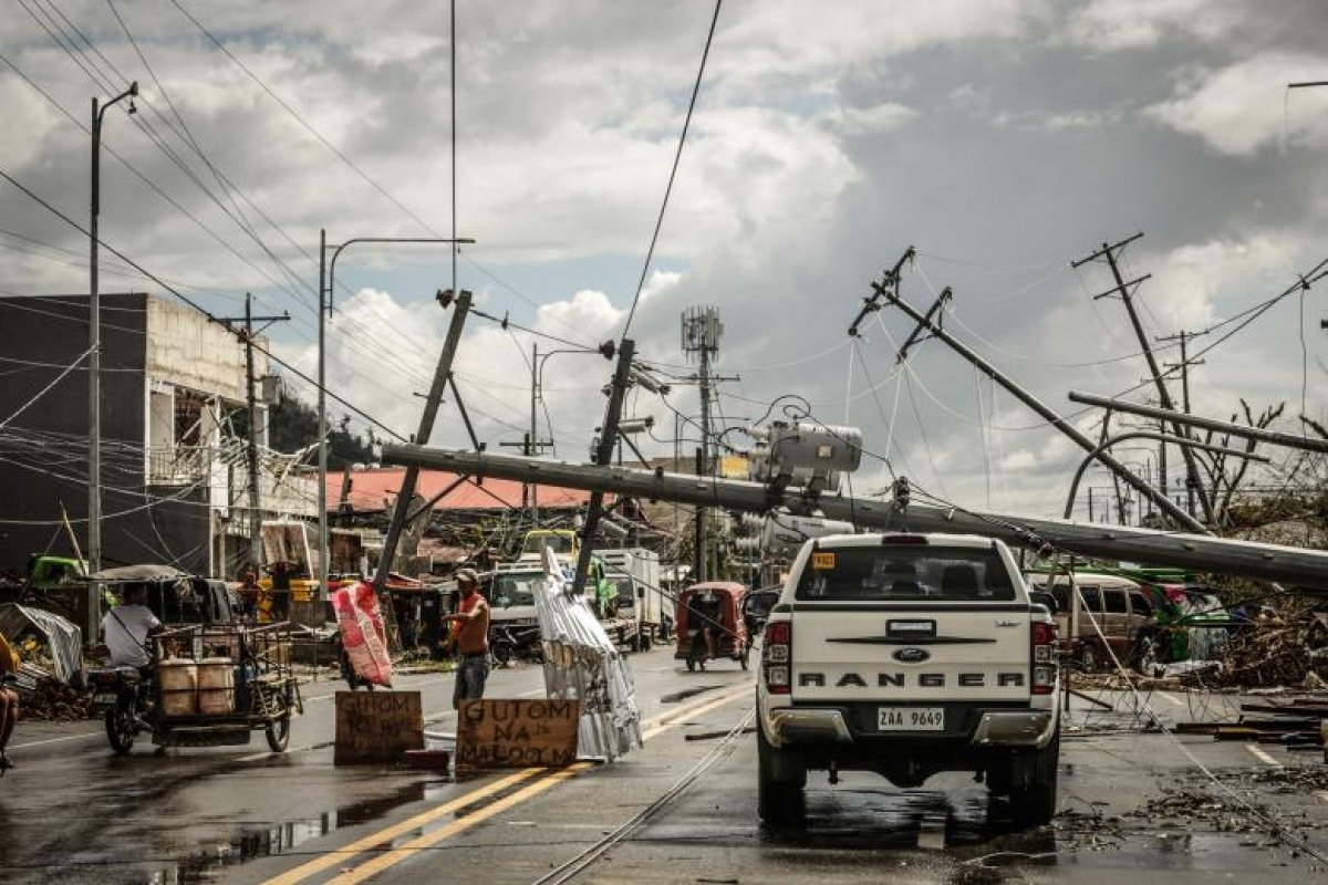 Một khu vực thiệt hai ở Philippines do bão Rai, Ảnh AFP