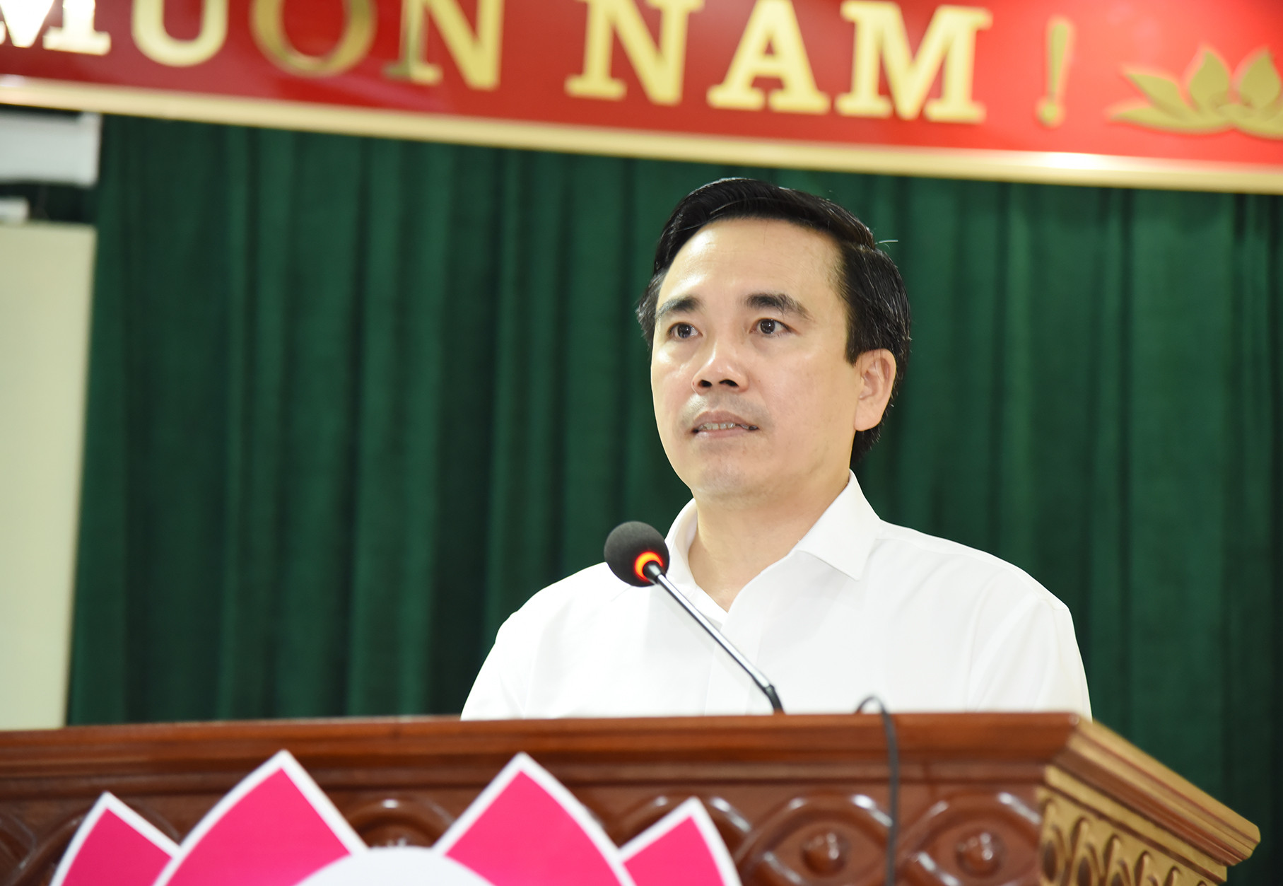 Phó Chủ tịch Thường trực UBMT tỉnh Lê Văn Ngọc báo cáo kết quả