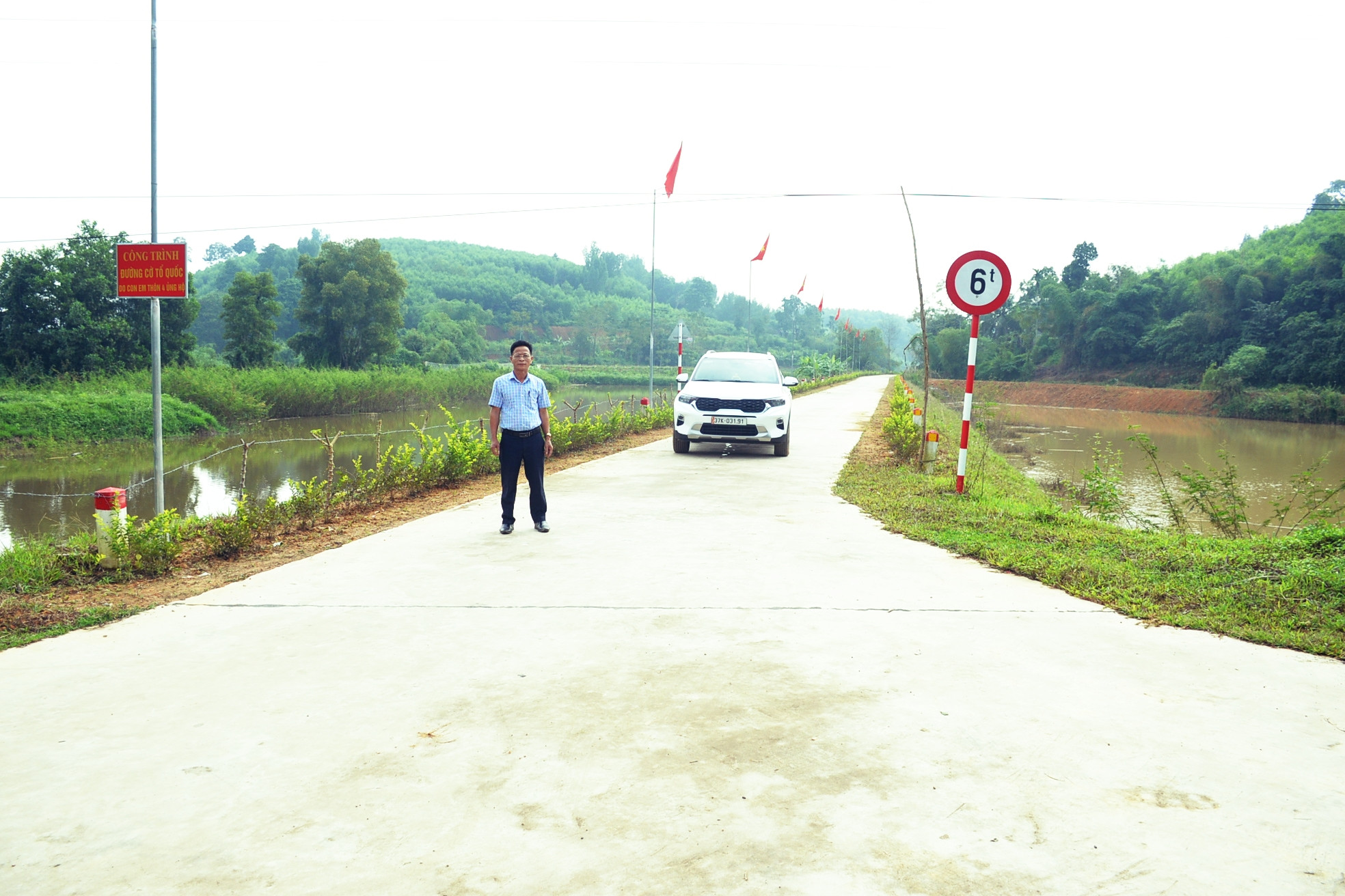 bna_Hệ thống giao thông chính của xã Cao Sơn, huyện Anh Sơn đã được bê tông hoá. Ảnh Xuân Hoàng.jpg