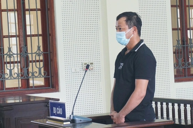 Nguyễn Văn Huấn tại phiên tòa xét xử. Ảnh: Như Bình.