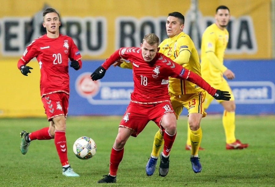 Romania outclass Lithuania to keep alive promotion hopes