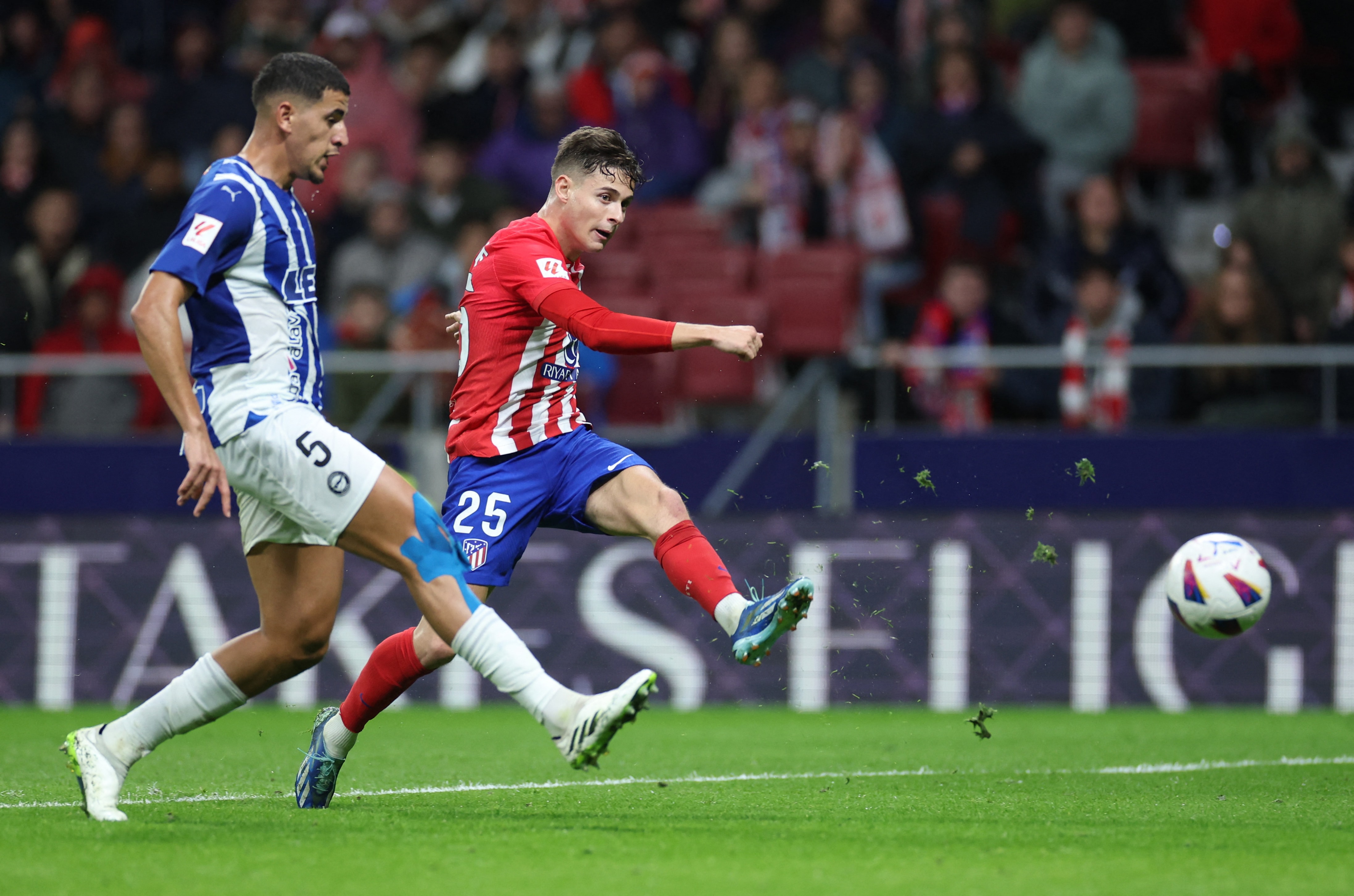 Atletico move up to third with 2-1 home win over Alaves | Reuters