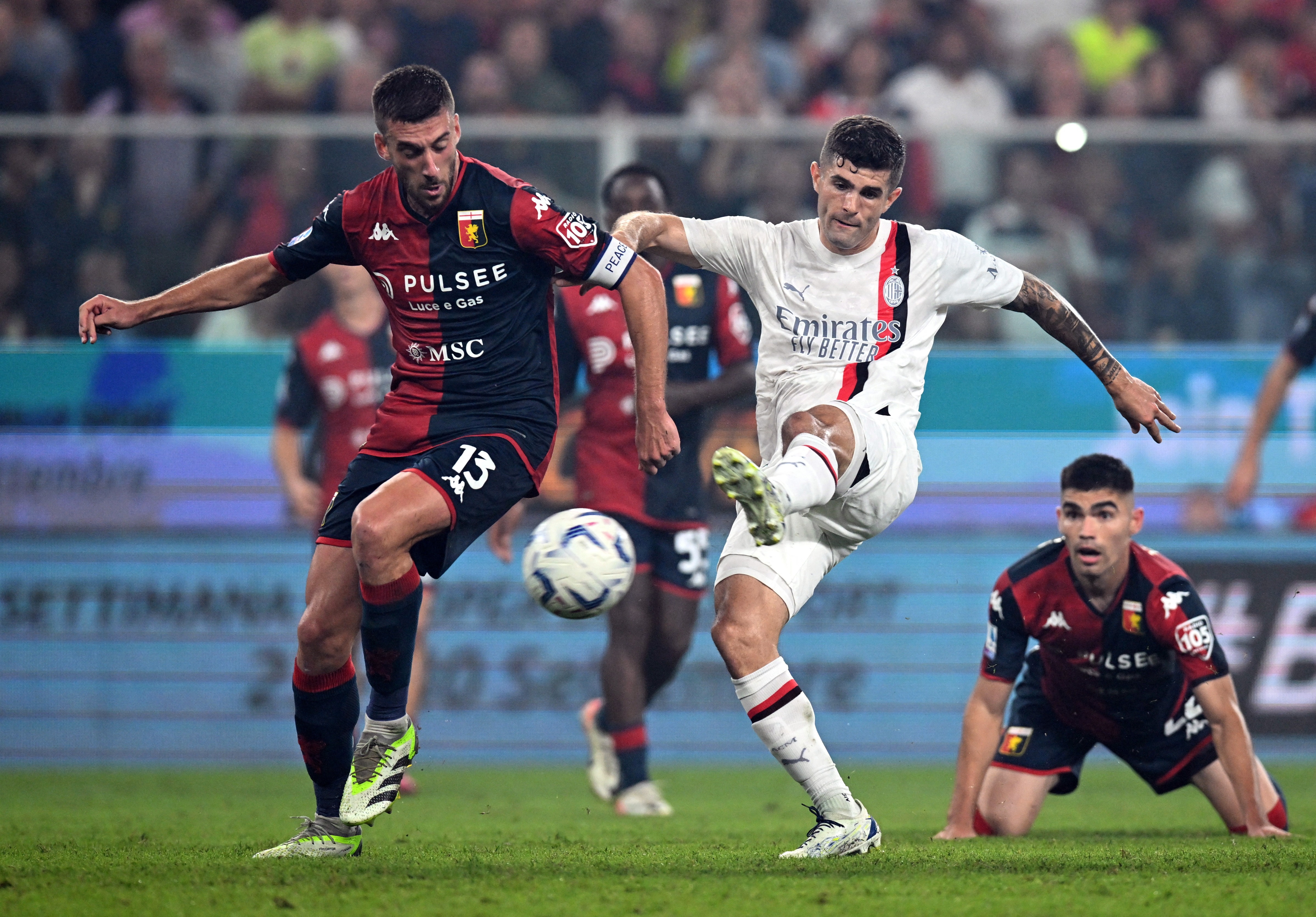Milan go top with late Pulisic strike at Genoa as Giroud ends match in goal | Reuters