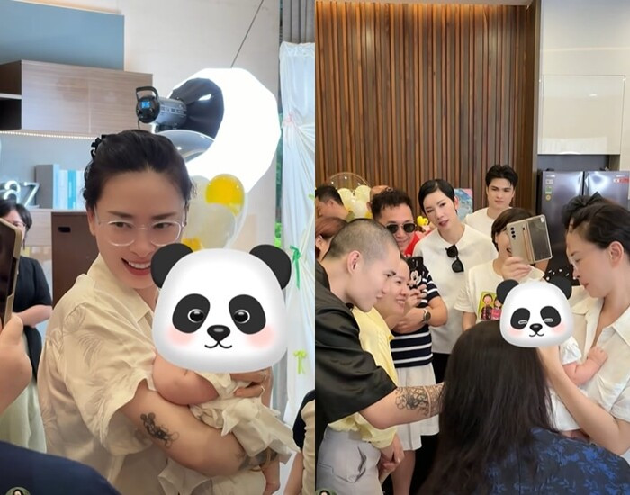 Ngô Thanh Vân và Huy Trần cùng con gái đầu lòng trong buổi tiệc ra mắt bạn bè, người thân.