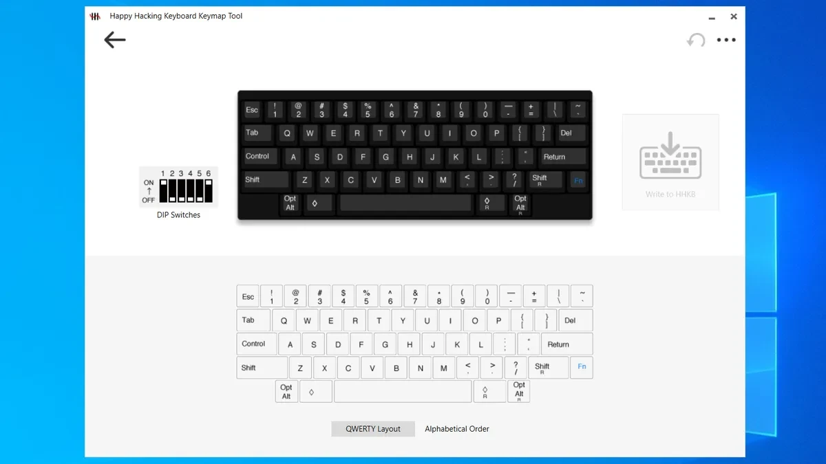 Mặt dưới của bàn phím HHKB với chân chống có thể điều chỉnh và bảng công tắc DIP