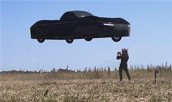 Alef Model A bay qua phía trước một chiếc Tesla Cybertruck trong video giới thiệu