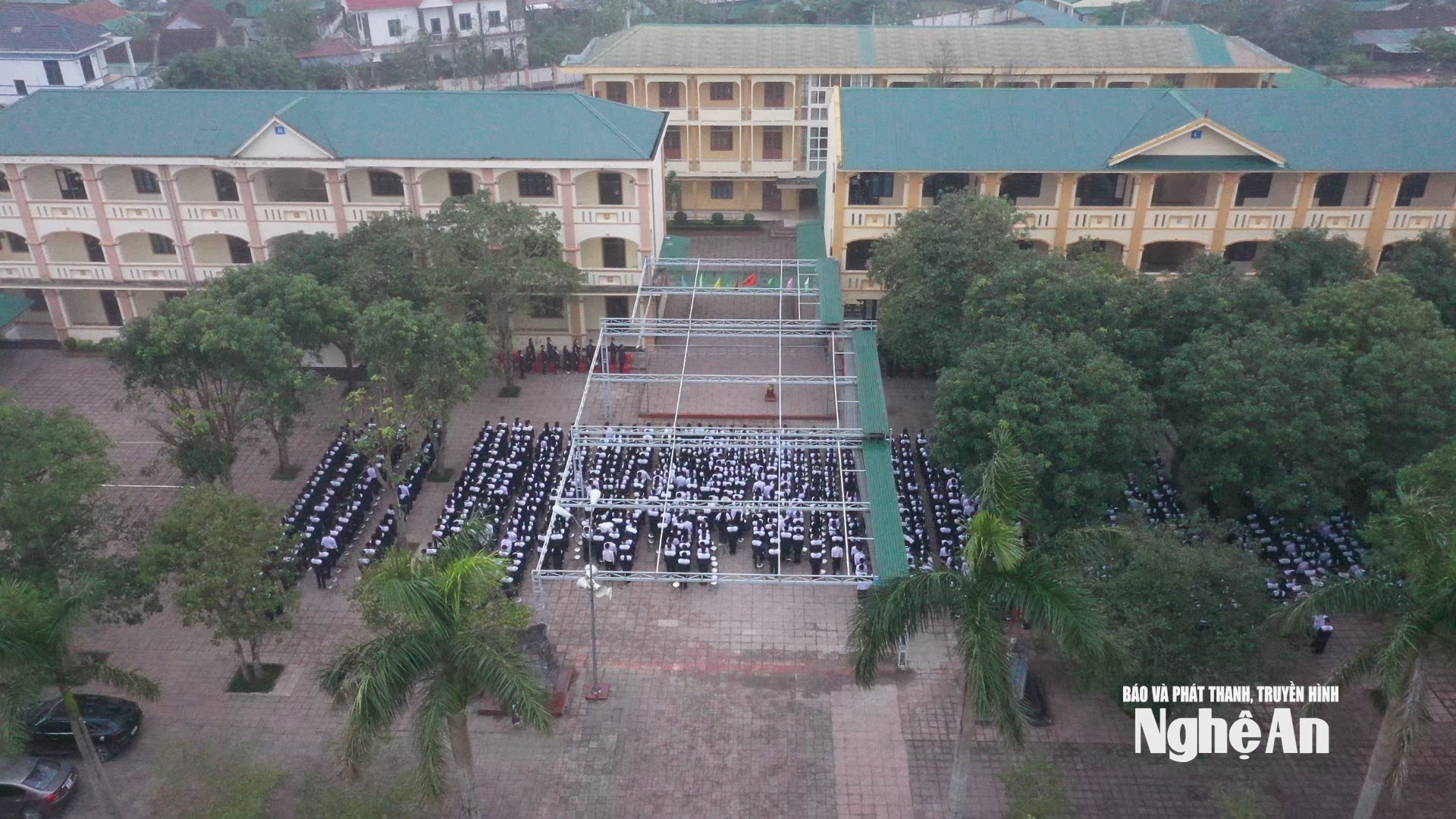 The weekly flag-raising ceremony at Yen Thanh 2 High School. Photo by Lang Linh.
