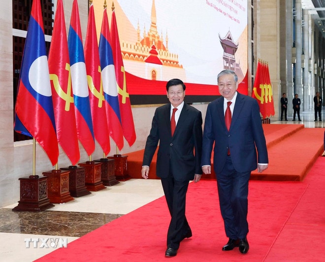 ttxvn-tong-bi-thu-to-lam-va-tong-bi-thu-chu-tich-nuoc-lao-chu-tri-hoi-nghi-thong-bao-ket-qua-dai-hoi-xiv-cua-dang-cong-san-viet-nam-6.jpg