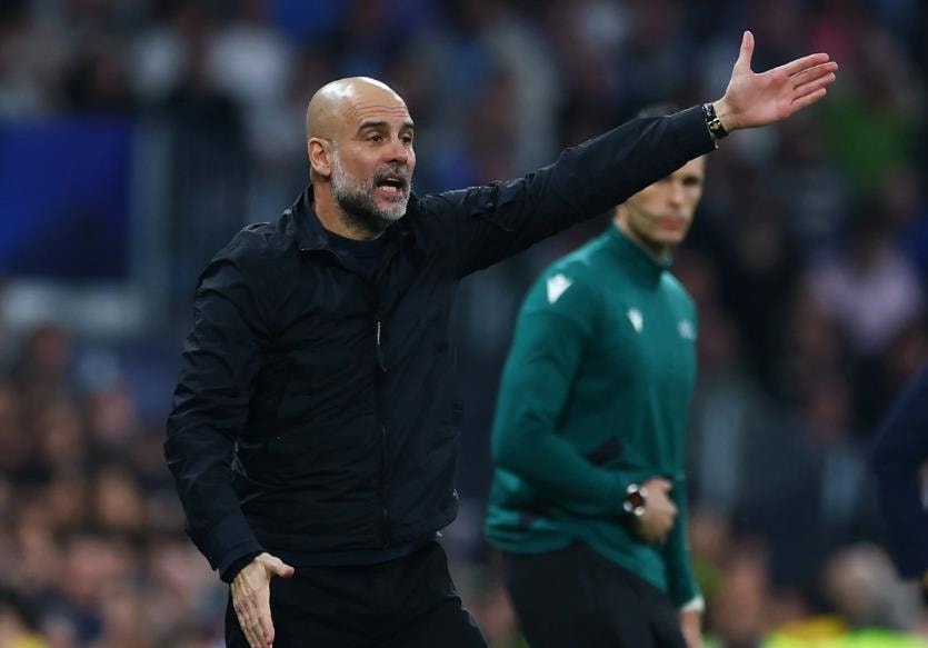 HLV Pep Guardiola bất lực trong việc tìm phương án xoay chuyển cục diện trận đấu tại Bernabeu.