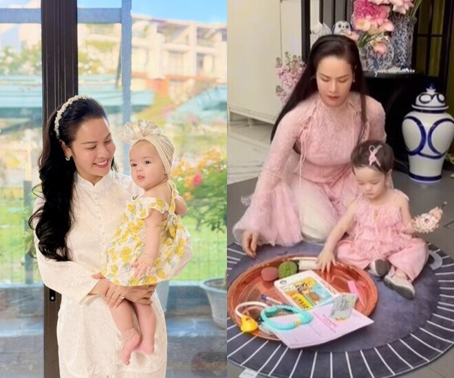 Julia cầm chiếc micro trong buổi tiệc thôi nôi.