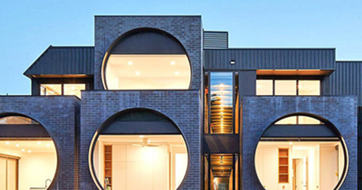 The apartment building stands out thanks to its enormous round windows.