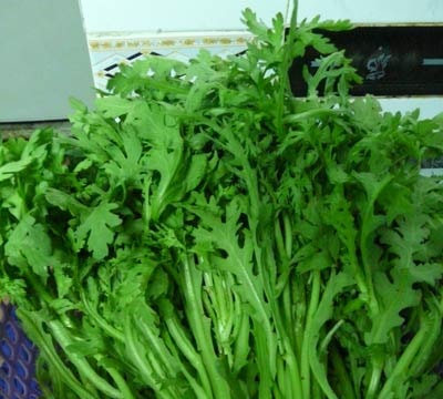Rau cải cúc trị đau đầu