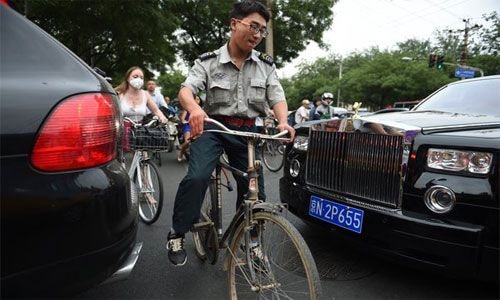 Cuộc chiến ôtô - xe đạp ở các siêu đô thị Trung Quốc