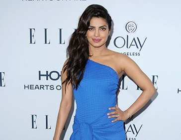 Mỹ nhân '50 sắc thái', Hoa hậu Thế giới 2000 mặc đẹp nhất tuần