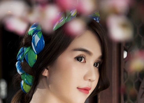 Ngọc Trinh diện áo dài, nổi bật với eo thon