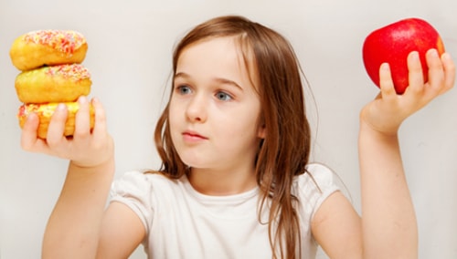 Khắc phục tình trạng tăng cân sau Tết cho bé