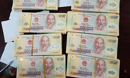 Bắt quả tang một phụ nữ sử dụng hơn 22 triệu đồng tiền giả