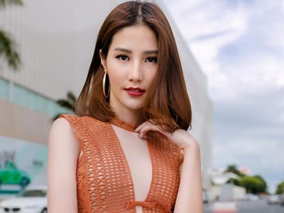 Diễm My 9X khoe ngực với váy ren