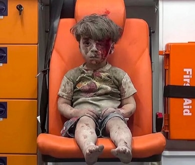 Nhói lòng hình ảnh những em bé Syria trong cuộc nội chiến đẫm máu