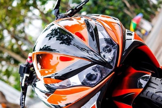 Honda PCX phối màu cam đen bắt mắt ở Hà Nội