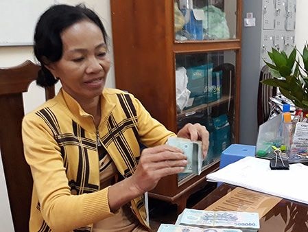 Bà chủ tờ vé số độc đắc nhận tiền sau 6 năm kiện tụng