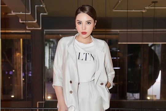  Hoa hậu Kỳ Duyên lăng xê váy áo theo xu hướng nam tính 