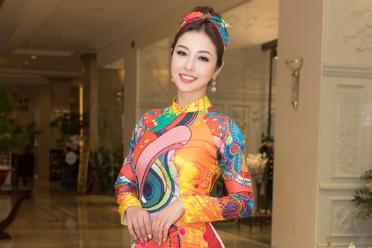 Jennifer Phạm tôn dáng 'gái ba con' với áo dài Tết