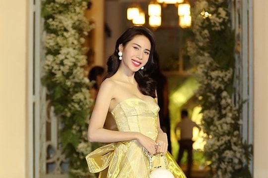 Vợ Công Vinh xách túi hàng hiệu đắt tiền đi sự kiện