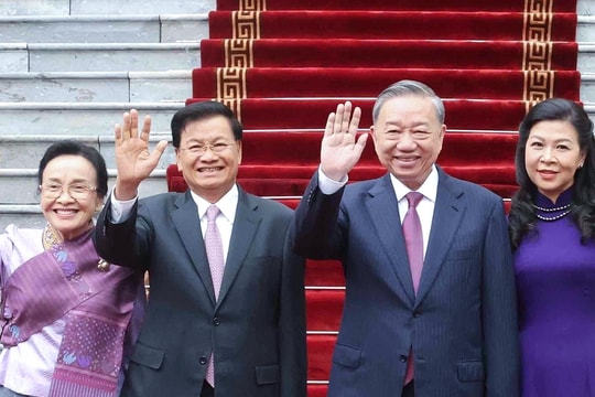 Việt Nam tổ chức nghi thức trọng thể chào đón Tổng Bí thư, Chủ tịch nước Lào và Phu nhân