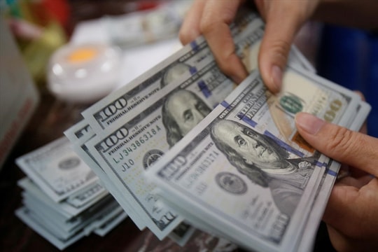Tỷ giá ngoại tệ 27/12: USD thế giới chịu áp lực, trong nước giảm nhẹ