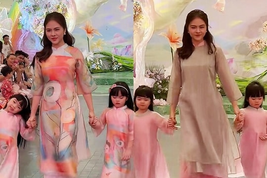 Cặp song sinh nhà diễn viên Vân Trang gây chú ý khi lần đầu trình diễn catwalk